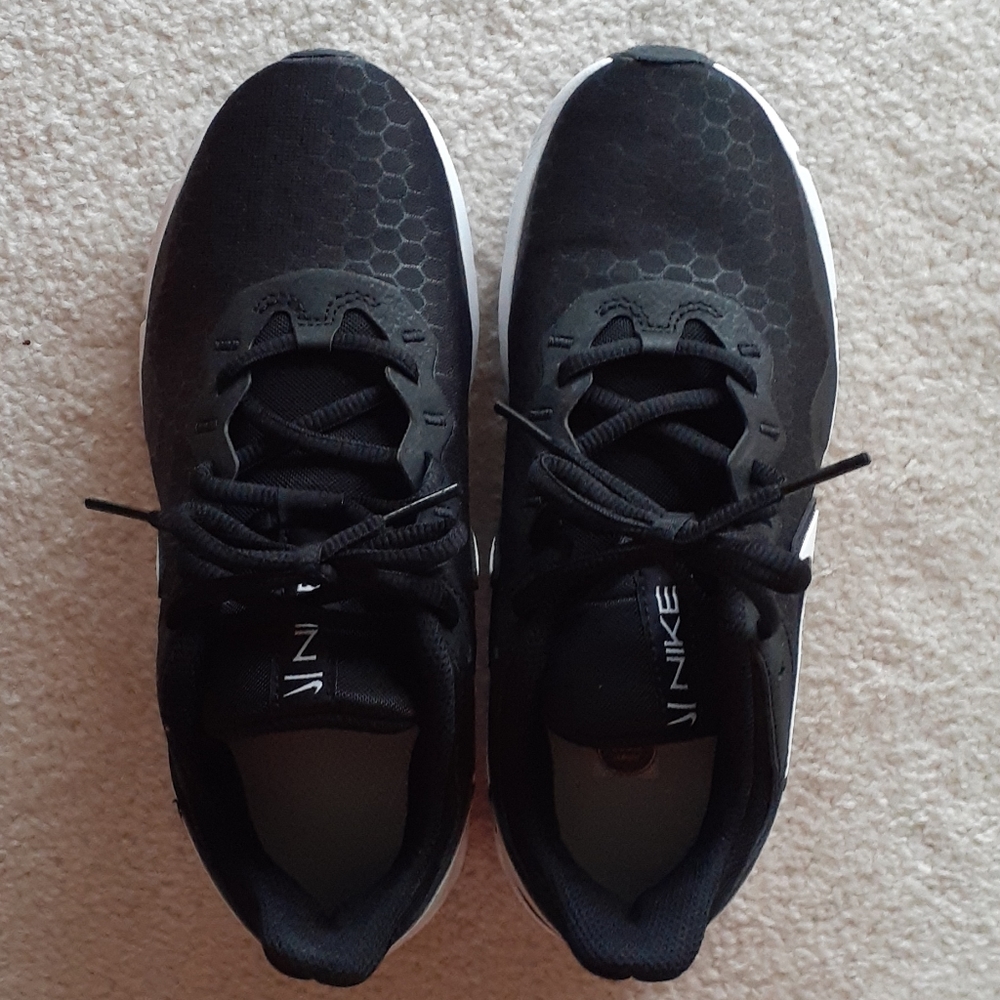 Size 5 women Nike running shoes